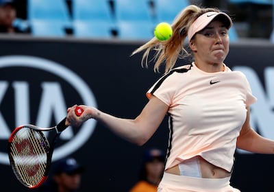 Ukraine's Elina Svitolina makes a forehand return to Serbia's Ivana Jorovic during their first round match at the Australian Open. Ng Han Guan / AP Photo