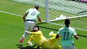 At the San Francisco Bay Area Stadium, Qatar's goalkeeper Mahmoud Abunada fouls Switzerland's Remo Freuler to give away a penalty. Reuters