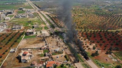 Syrians protest and burn tyres in an attempt to block traffic on the M4 highway, which links the northern Syrian provinces of Aleppo and Latakia, before incoming joint Turkish and Russian military patrols (as per an earlier agreed upon ceasefire deal) in the village of al-Nayrab, about 14km southeast of the city of Idlib. AFP