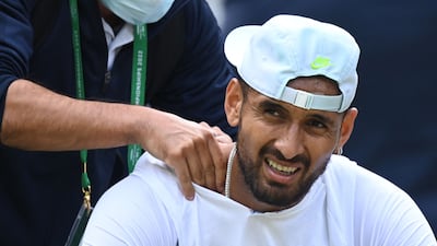 Australia's Nick Kyrgios receives medical treatment during his round of 16 match against Brandon Nakashima of the US. AFP