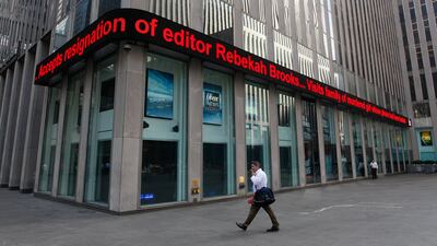 July 15, 2011: News about Rebekah Brooks resignation is displayed on the Fox News ticker at building which houses the News Corp. headquarter in New York. Rupert Murdoch accepted the resignation of The Wall Street Journal's publisher and the chief of his B???