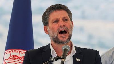 Israeli Finance Minister Bezalel Smotrich speaks at a press conference in August on the E1 settlement, which would split East Jerusalem from the occupied West Bank. Reuters