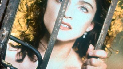 A brunette Madonna in the video for Like a Prayer, 1989. Rex