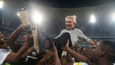 Saudi Arabia's head coach Bert van Marwijk is thrown into the air by his players after winning the 2018 World Cup group B qualifying soccer match between Saudi Arabia and Japan in Jiddah, Saudi Arabia, Tuesday, Sept. 5, 2017. Saudi Arabia won 1-0. (AP Photo)