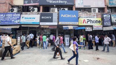 Mobile phones, tablets, televisions and desktop and notebook computers are among the high priority products under the 'Make in India' initiative. Prashanth Vishwanathan / Bloomberg