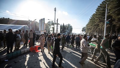 Several people were injured in a stampede after the explosions. AP