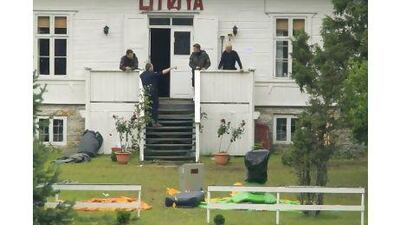 Police continue their investigations on the island of Utoya where the massacre took place. Terje Bendiksby / EPA