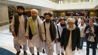 Mullah Abdul Ghani Baradar, the Taliban group's top political leader, third from left, arrives with other members of the Taliban delegation for talks in Moscow in May 2019. AP