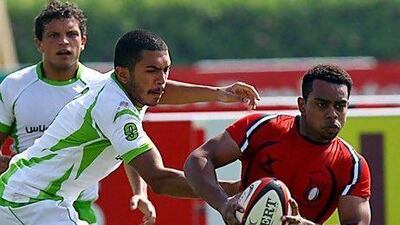 Majid Al Balooshi, right, is one of the few Emirati players to progress to the UAE national team. The National