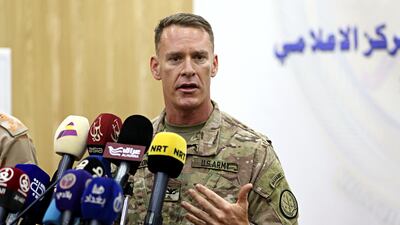 US army Col Ryan Dillon, spokesman for the US-led coalition against ISIL, said the coalition was still monitoring the ISIL convoy in Syria. In this picture, taken on August 24, 2017, he is speaking at a press conference in Baghdad, Iraq. Karim Kadim / The Associated Press
