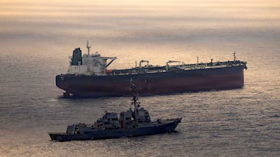 The US Navy's guided-missile destroyer USS Rafael Peralta enforces a maritime blockade against the Iran-flagged crude oil tanker Herby as it attempts to sail towards an Iranian port on April 24, 2026. US Navy / AFP