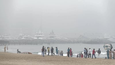Heavy morning fog at Sunset Beach next to the Burj Al Arab. Antonie Robertson / The National.