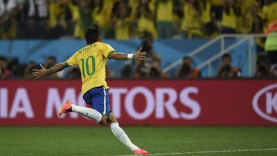 Neymar celebrates after scoring against Croatia in Brazil's World Cup opening victory on Thursday at the Arena Corinthians in Sao Paulo, Brazil. Dimitar Dilkoff / AFP / June 12, 2014