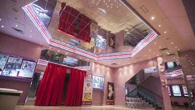 Inside the Eldorado cinema. Instead of a booking system, staff use a printed seating plan, marking seat numbers on tickets. Mona Al Marzooqi / The National