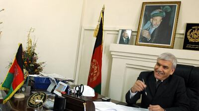 Afghanistan’s former commerce minister Mohammed Amin Farhang at his office in Kabul in 2006. Farzana Wahidy / AFP