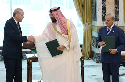 Saudi Crown Prince Mohammed bin Salman with Turkish President Recep Tayyip Erdogan, left, and Pakistani Prime Minister Shehbaz Sharif, right, in Makkah. Reuters