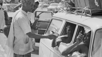 Street traders sell drinks to Hajj pilgrims in Makkah in August 1968.