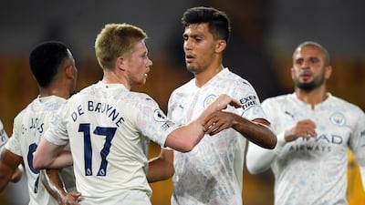 Kevin De Bruyne celebrates with teammates. EPA