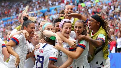 The United States celebrate after Megan Rapinoe, third right, scored the first of their two goals in the 2-0 win over the Netherlands in the Fifa Women's World Cup final. Getty
