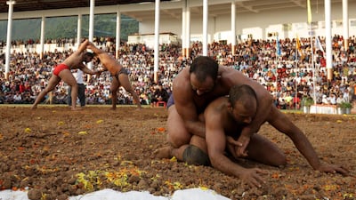 Traditional Indian wrestling in Katra on Wednesday, October 2. EPA