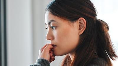 Biting nails can be tied to stress. Photo: Yuri Arcurs