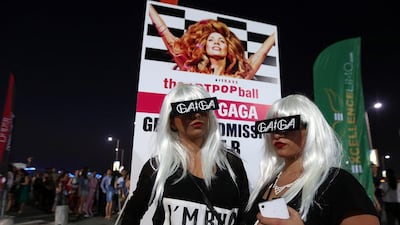 Dalia Amer, left,and Mays Dawood show their love for Lady Gaga by dressing up. Satish Kumar / The National