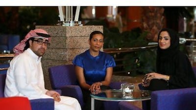 Left to right: Rashid al Marri, Awatif Yahya and Butheina Kazim will join Arif Ahmad (not shown) as Fulbright scholars this summer. Pawan Singh / The National