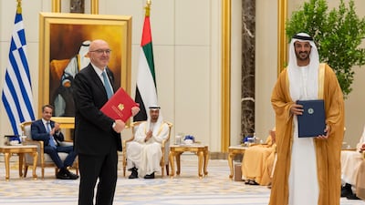 Kostas Fragogiannis, Deputy Minister of Economic Diplomacy and Openness at the Greek Ministry of Foreign Affairs, and Abdulla bin Touq, Minister of Economy.