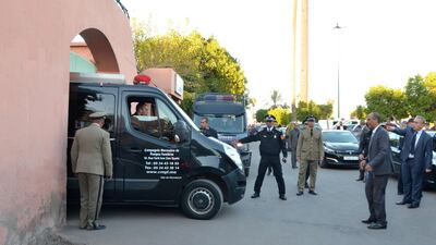 A van carrying the bodies of the two murdered Scandinavian hikers leaves for the airport from a morgue in Marrakech on December 20, 2018. AFP