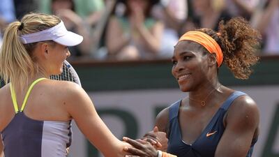 Serena Williams, right, holds a 17-2 winning record against Maria Sharapova. Miguel Medina / AFP