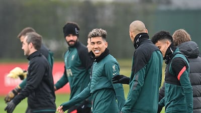 Liverpool midfielder Roberto Firmino trains on the eve of their Champions League quarter-final second leg against Benfica. AFP
