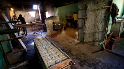 Sudanese bakers prepare bread at a bakery in the town of Atbara, an industrial town 350 kilometres northeast of Sudan’s capital Khartoum. AFP