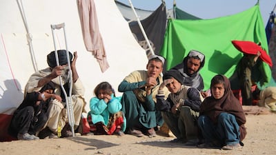 Families who fled their villages after Taliban launched massive attacks in different districts of Helmand province, live in temporary shelters in provincial capital Lashkargah, Helmand, Afghanistan, 24 November 2020. Violence has surged across the country in recent weeks, despite the Afghan government and the Taliban committing to be on the defensive to help the ongoing intra-Afghan peace talks that are underway in Doha for over a month. EPA
