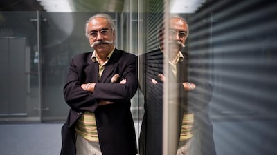 Mustapha Karkouti poses for a portrait at Abu Dhabi International Airport in 2008. ( Philip Cheung / The National )