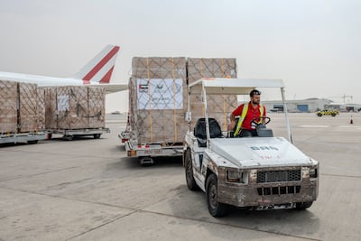 More than 60 tonnes of school and stationery supplies are loaded onto a flight at Sharjah International Airport as part of the 'With Knowledge We Rise' campaign. Photo: Ahmed Ramzan / The National