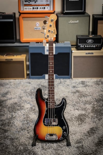 A 1976 Fender Precision Bass in classic sunburst, priced at Dh25,000. Antonie Robertson / The National