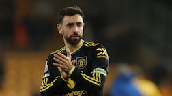 Manchester United's Bruno Fernandes applauds fans after the match at Molineux. Reuters
