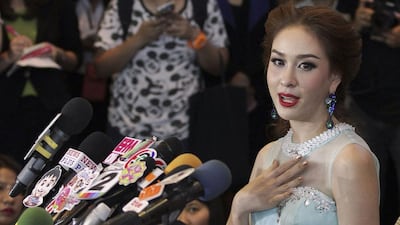 Miss Universe Thailand Weluree Ditsayabut, 22, speaks during a news conference at Renaissance Hotel in Bangkok June 9, 2014. Ditsayabut renounced her title on Monday over remarks she made on social media including one that "red shirt" activists, supporters of ousted prime minister Yingluck Shinawatra, should all be executed. Reuters