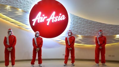 Air Asia is trialling designer PPE suits created by Filipino designer Puey Quinones. Courtesy Puey Quinones / Instagram