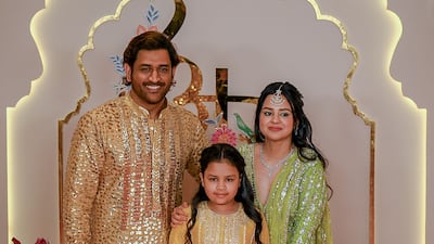 Former Indian cricket captain M S Dhoni, wife Sakshi Singh and daughter Ziva. AFP
