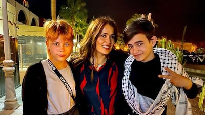 Lia McHugh and Zain Al Rafeea, right, with Salma Hayek, centre, who is starring as the leader of the 'Eternals' in the Marvel film. Instagram/Salma Hayek