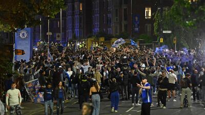 Chelsea supporters celebrate in streets surrounding their Stamford Bridge stadium in London their Champions League victory. AFP