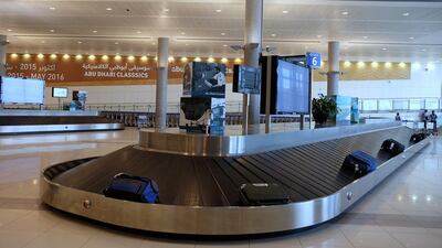 The baggage arrival area in Terminal 3 at Abu Dhabi International Airport. The airport will continue as normal during the drill. Delores Johnson / The National