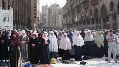 Muslim worshippers pray outside the Grand Mosque in the holy city of Mecca prior to the start of the annual Hajj pilgrimage. Karim Sahib / AFP