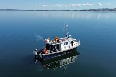 A vessel carries divers to the site in the Bay of Aarhus. AP