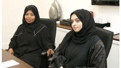 Fatma Hassan Essa (left), media and community awareness manager, and Roudha Abdulla Albahri, activities co-ordinator, at the Dubai Foundation for Women and Children. Jaime Puebla / The National