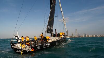 The Abu Dhabi boat Azzam cuts through the choppy sea as they complete leg two, Cape Town South Africa to Abu Dhabi. Mike Young / The National
