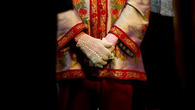 Cream-coloured gloves, like the ones Ginsburg is wearing here, are part of the collection of almost 100 items being auctioned. AP