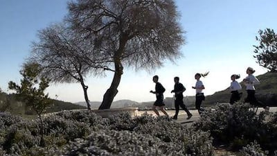 Runners from The Run Across Palestine are planting olive trees along their journey. Courtesy Stone Hut / On The Ground