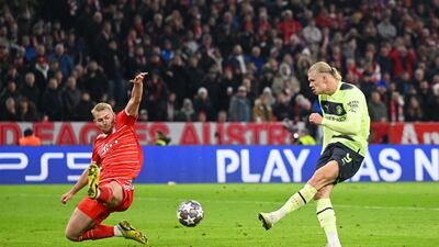 Erling Haaland of Manchester City scores the first goal under pressure from Matthijs de Ligt of Bayern Munich. Getty